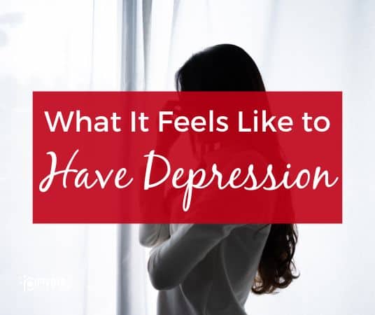 A graphic that reads "What it feels like to have depression" in white text on a red rectangle over a stock photo of a sad looking woman looking out a window in black and white.