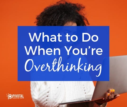 A graphic that reads What to Do When You’re Overthinking over a stock photo of a Black woman using a computer in front of a dark orange background.